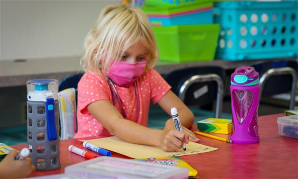 Girl works on Constitution craft